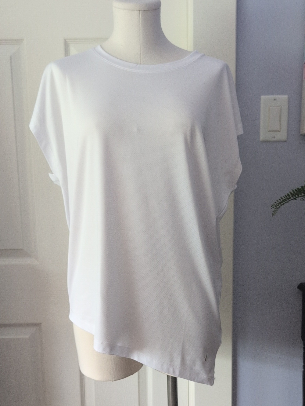 Women’s Indyeva Relaxed Crew Neck Top With Asymmetrical Hemline.